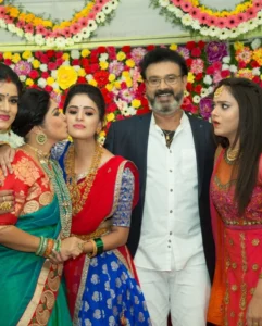 Thanuja Puttaswamy with parents — father Puttaswamy and mother Savithri family portrait 2026